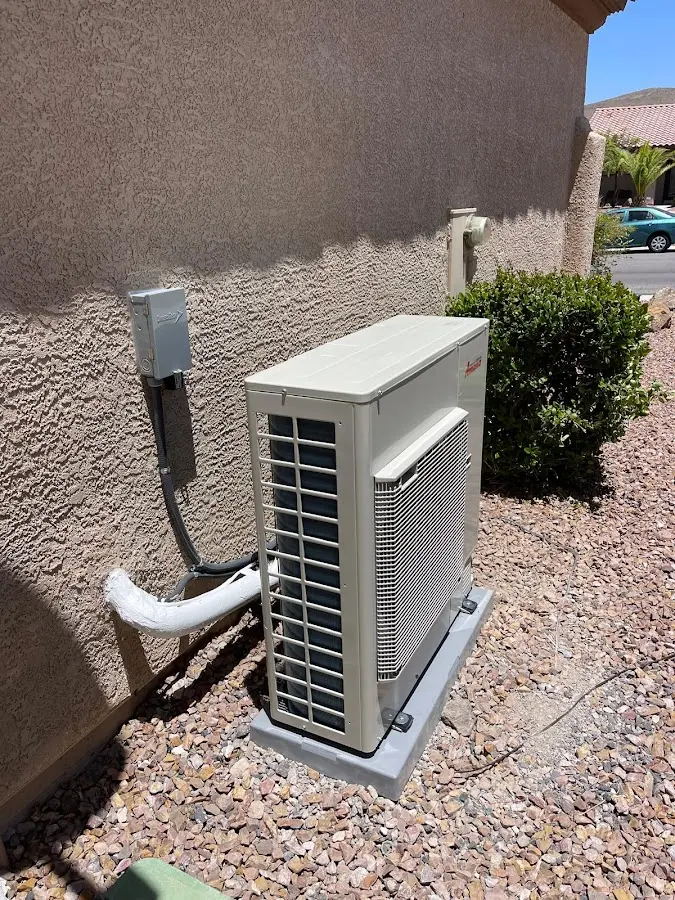 Residential air conditioning condenser unit in Palm Valley